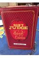 VENDULA LONDON : sac clutch modèle BOOK "don't judge a book by its cover"